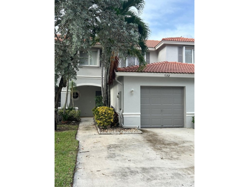 Lovely carpet free 3/2,5 1 car garage townhome in gated - Beach Townhome/Townhouse for sale in Riviera Beach, Florida on Beachhouse.com