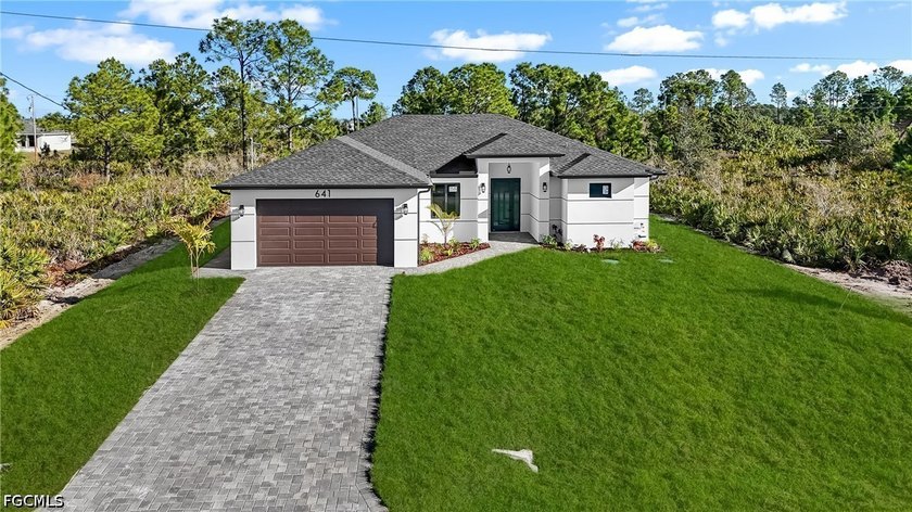 Brand-New Construction in Lehigh Acres! This beautifully - Beach Home for sale in Lehigh Acres, Florida on Beachhouse.com