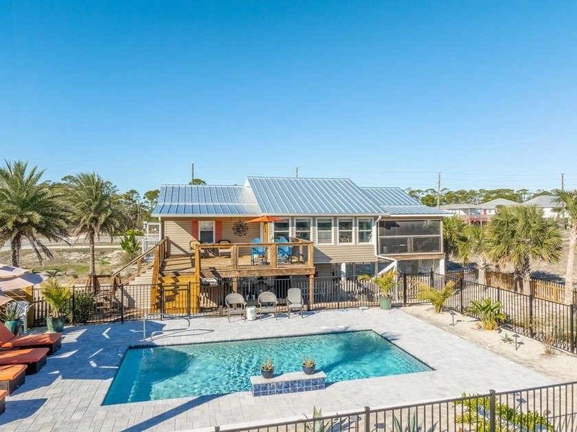 Delightful beach cottage on a CORNER location with direct Beach - Beach Home for sale in St. George Island, Florida on Beachhouse.com