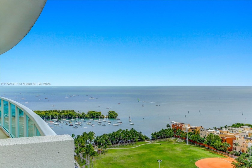 Spectacular bay views from this stunning corner residence - Beach Condo for sale in Coconut Grove, Florida on Beachhouse.com