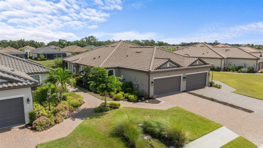 This Exquisite Villa with a Lake View located in the - Beach Home for sale in Lakewood Ranch, Florida on Beachhouse.com