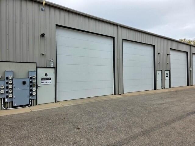 This hard-to-find 4,500 SF condo warehouse is perfectly situated - Beach Commercial for sale in Ferrysburg, Michigan on Beachhouse.com