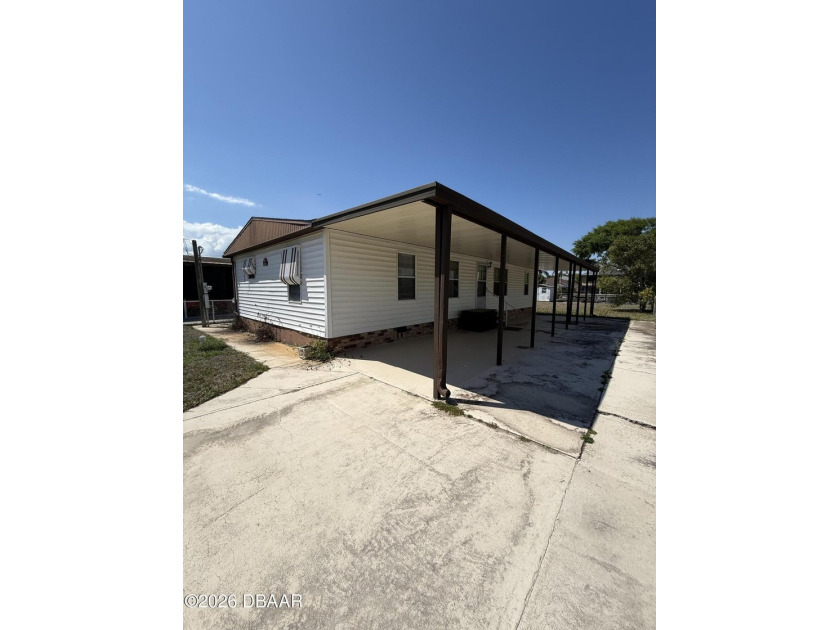Welcome to 160 Gary Ave, Edgewater, FL -- a beautifully located - Beach Home for sale in Oak Hill, Florida on Beachhouse.com