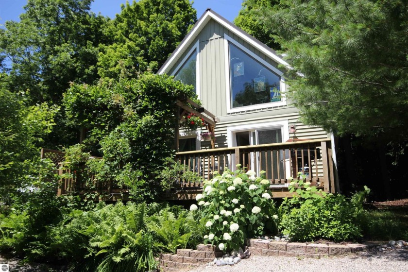 What an opportunity to have a completely remodeled home and the - Beach Home for sale in Traverse City, Michigan on Beachhouse.com