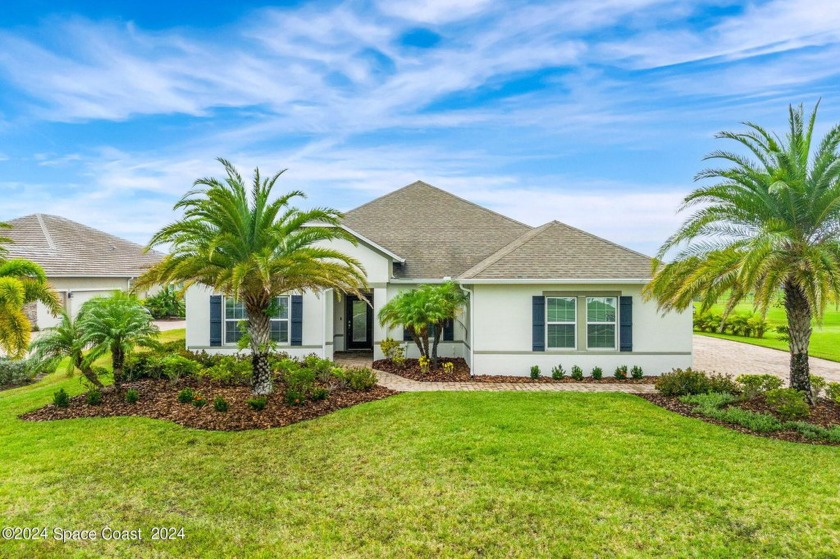 ELEGANT, NATURAL LAKEFRONT, CUSTOM HOME ON NEARLY AN ACRE WITH - Beach Home for sale in Melbourne, Florida on Beachhouse.com