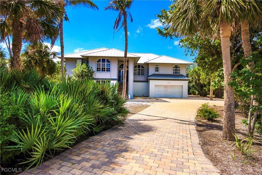 Located within the exclusive and intimate community of Gopher - Beach Home for sale in Sanibel, Florida on Beachhouse.com