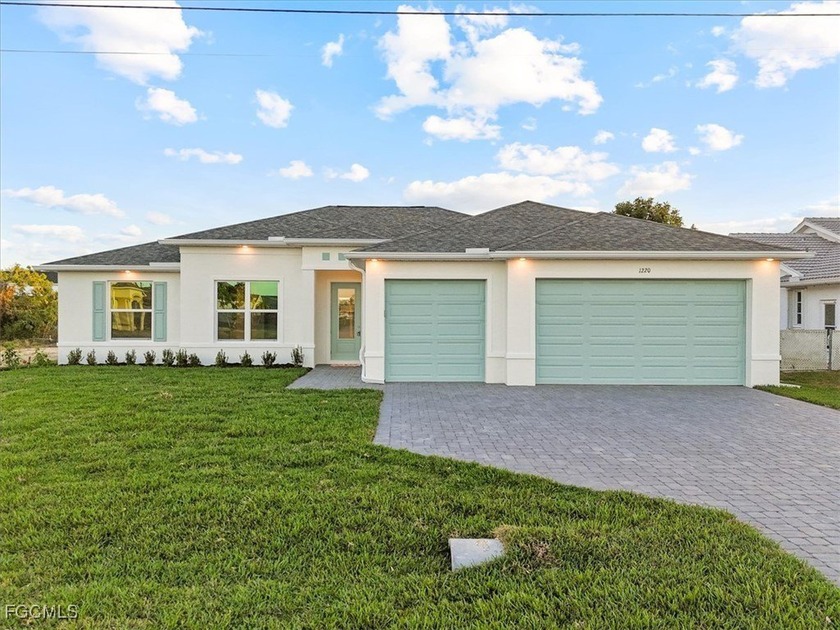 Welcome to The Coral Haven Plan! An exceptional new construction - Beach Home for sale in Cape Coral, Florida on Beachhouse.com