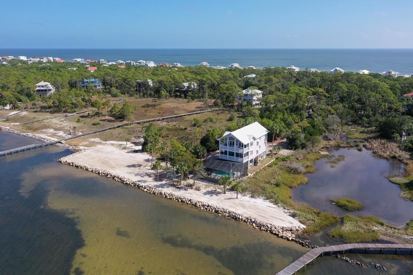 *Sunset Serenade*. St George Plantation Bayfront Home on 2 Lots - Beach Home for sale in St. George Island, Florida on Beachhouse.com
