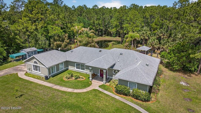 Tucked away on just over 5 private acres in the desirable Ormond - Beach Home for sale in Ormond Beach, Florida on Beachhouse.com