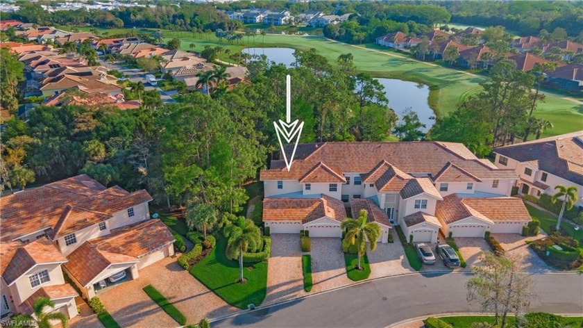 GOLF MEMBERSHIP INCLUDED (VALUED AT $50,000) END UNIT - TWO CAR - Beach Home for sale in Bonita Springs, Florida on Beachhouse.com