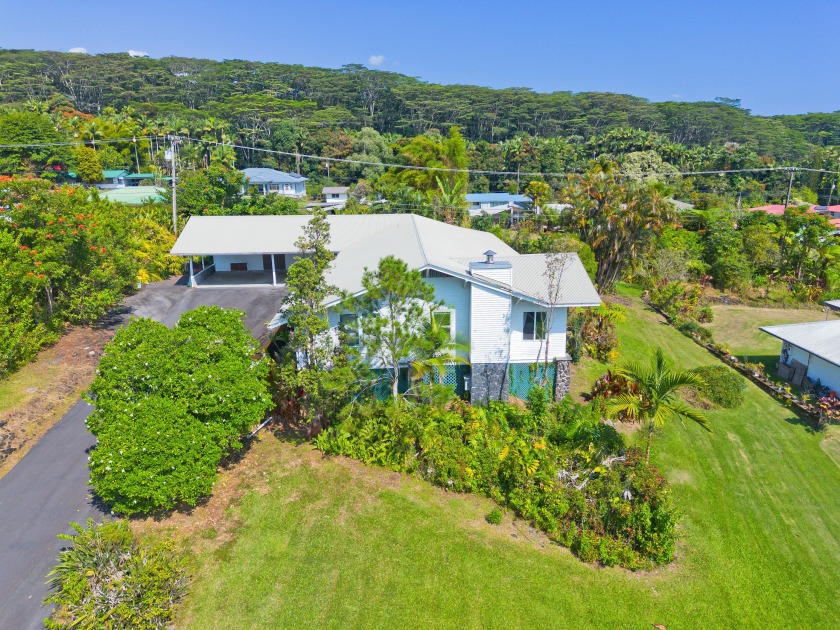 Welcome to this beautifully maintained home set on a lush - Beach Home for sale in Hilo, Hawaii on Beachhouse.com