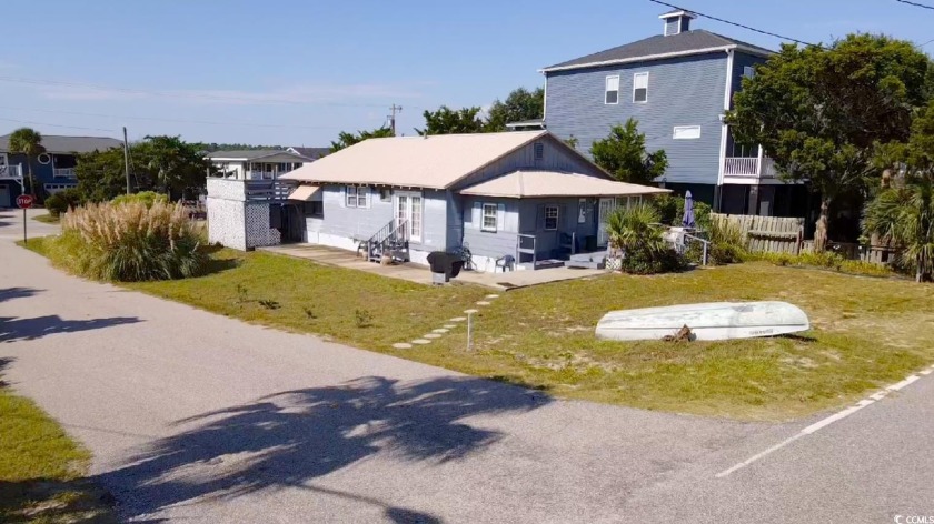 350 Underwood Drive takes you back in time to the charm of a - Beach Home for sale in Garden City Beach, South Carolina on Beachhouse.com