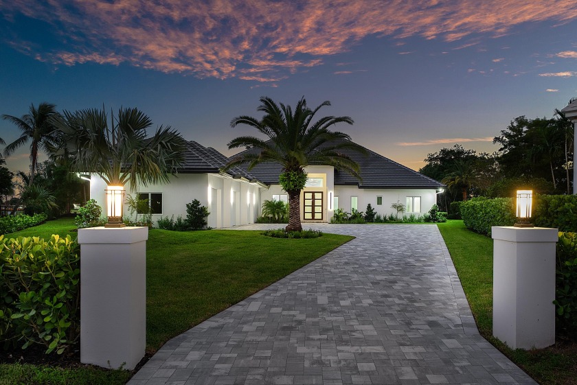 Absolutely MINT! Offering an impressive .65 acre Lot with both - Beach Home for sale in Atlantis, Florida on Beachhouse.com