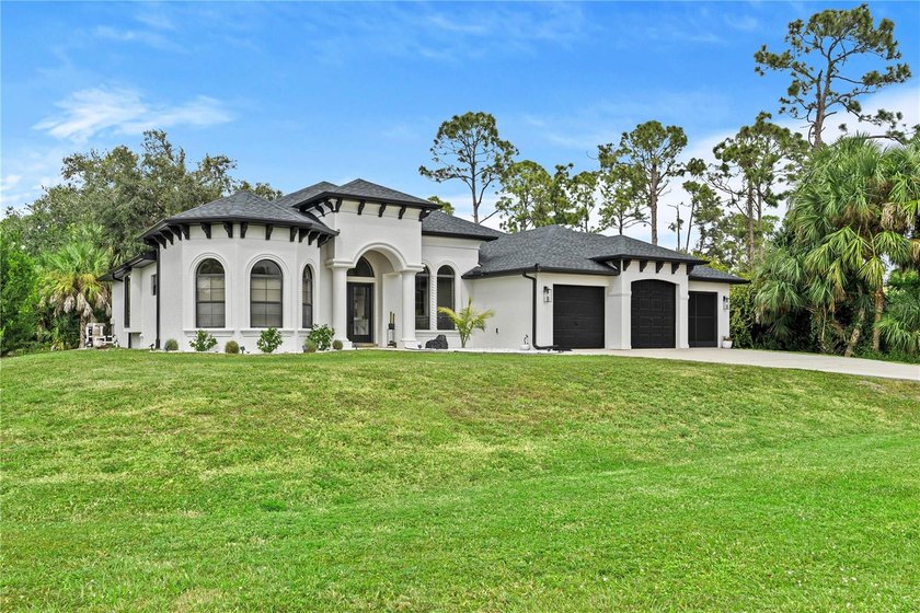 Welcome to this beautifully designed home on an oversized lot - Beach Home for sale in North Port, Florida on Beachhouse.com