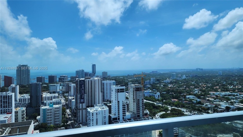 Enjoy breathtaking views of the Bay, the Brickell skyline, and - Beach Condo for sale in Miami, Florida on Beachhouse.com