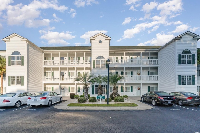 This stunning 3-bedroom, 2-bath condo is the epitome of coastal - Beach Condo for sale in Little River, South Carolina on Beachhouse.com