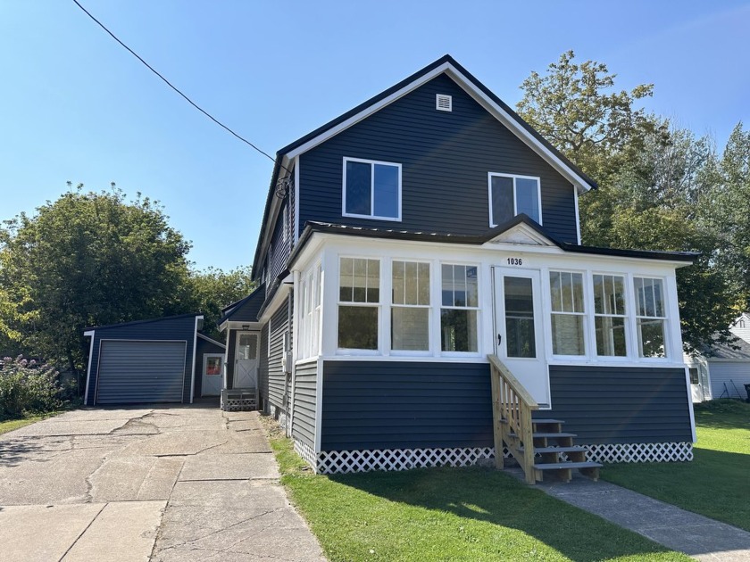 This 3-bedroom, 2-bathroom home offers a view of freighters on - Beach Home for sale in Sault Sainte Marie, Michigan on Beachhouse.com