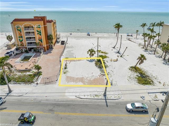 Experience the Epitome of coastal living with this Amazing - Beach Lot for sale in Fort Myers Beach, Florida on Beachhouse.com