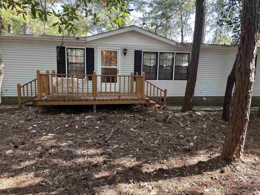 HOME IS SOLD FURNISHED. NO HOA !  THIS TWO BEDROOM , TWO BATH - Beach Home for sale in Murrells Inlet, South Carolina on Beachhouse.com