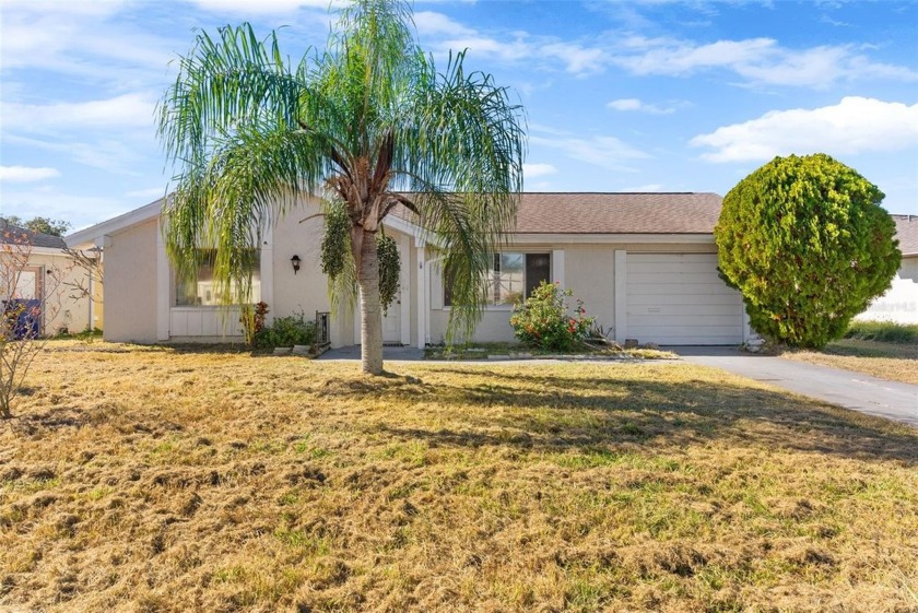 Discover the possibilities in this 3-bedroom, 2-bathroom home - Beach Home for sale in Holiday, Florida on Beachhouse.com