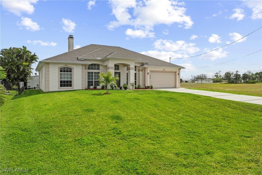 Welcome to this beautifully maintained 4-bedroom + den - Beach Home for sale in Cape Coral, Florida on Beachhouse.com