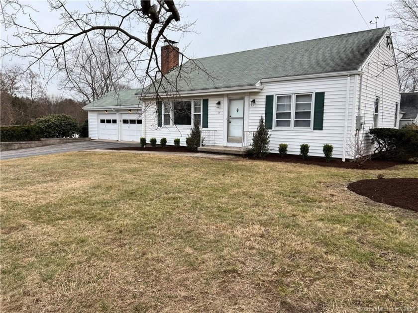 Welcome to this charming 2-bedroom home nestled on a spacious - Beach Home for sale in Fairfield, Connecticut on Beachhouse.com