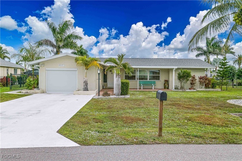 Discover this charming waterfront retreat that perfectly blends - Beach Home for sale in Cape Coral, Florida on Beachhouse.com