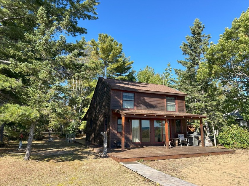 Beautiful and impeccably maintained, this 3-bedroom, 1-bathroom - Beach Home for sale in Paradise, Michigan on Beachhouse.com