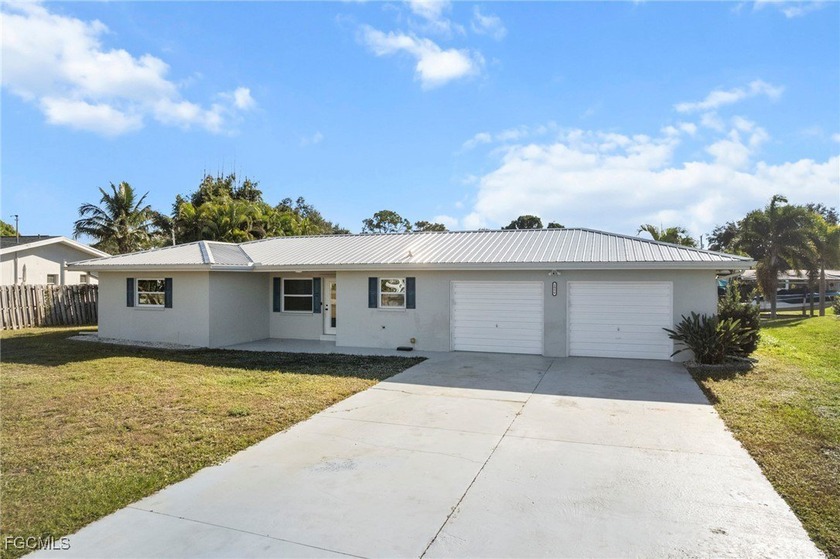 Completely remodeled and move-in ready, this beautiful river - Beach Home for sale in North Fort Myers, Florida on Beachhouse.com