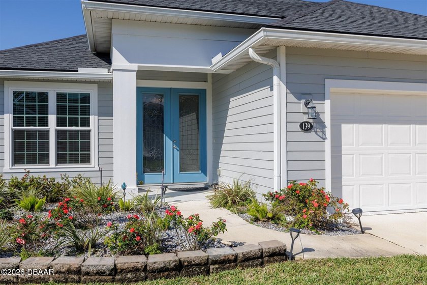 Welcome to 139 Wood Stork Lane -- a beautifully upgraded 2023 - Beach Home for sale in Palm Coast, Florida on Beachhouse.com
