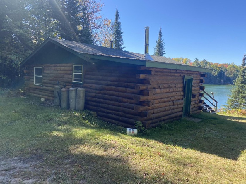 Imagine owning a Rustic full log cabin and 100 acres +/- on - Beach Home for sale in Mcmillan, Michigan on Beachhouse.com