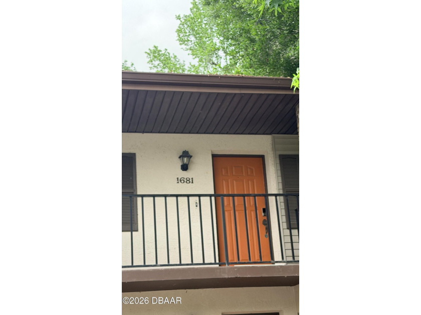 This cute condo is located in a gated community set back from - Beach Condo for sale in Holly Hill, Florida on Beachhouse.com
