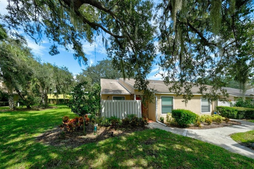 This beautifully renovated 3-bedroom, 2-bathroom villa is one of - Beach Condo for sale in Sarasota, Florida on Beachhouse.com