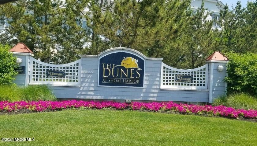 Discover the epitome of shoreline living at 44 Golden Eye Ln, a - Beach Condo for sale in Port Monmouth, New Jersey on Beachhouse.com