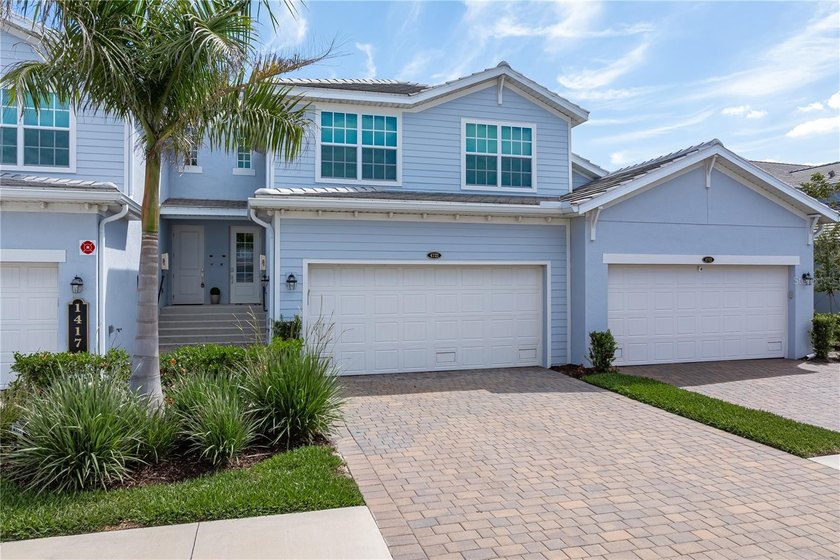 TURNKEY HERITAGE LANDING COACH HOME W/PANORAMIC LAKE & AQUA - Beach Home for sale in Punta Gorda, Florida on Beachhouse.com