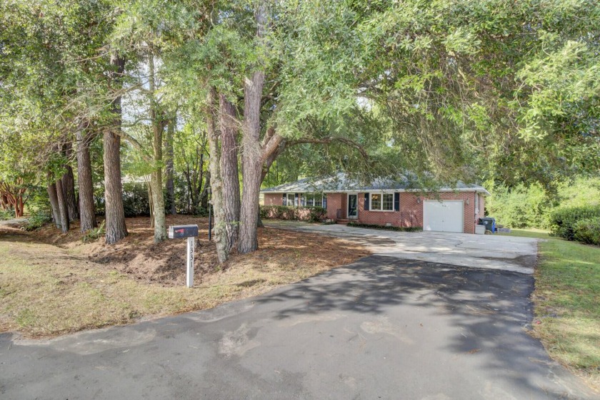 This classic brick ranch home is nestled in the heart of - Beach Home for sale in Charleston, South Carolina on Beachhouse.com