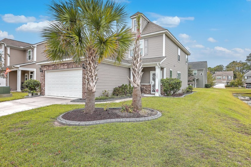 Welcome to this stunning open-concept home, perfectly situated - Beach Home for sale in Johns Island, South Carolina on Beachhouse.com