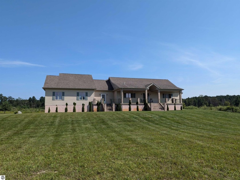 A beautiful country estate awaits with this stunning home on a - Beach Home for sale in Tawas City, Michigan on Beachhouse.com