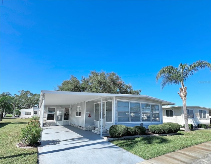 This charming 2-bedroom, 2-bathroom home is nestled in the heart - Beach Home for sale in Largo, Florida on Beachhouse.com