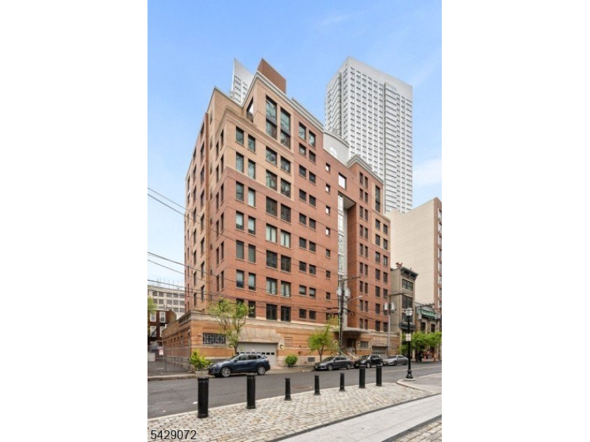 Spacious and bright corner unit overlooking Provost Square. This - Beach Condo for sale in Jersey City, New Jersey on Beachhouse.com