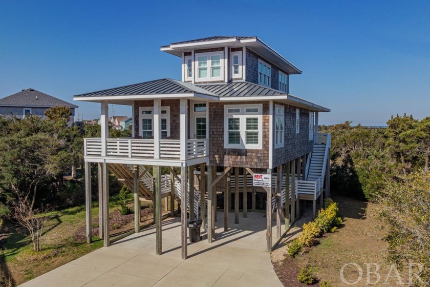 Discover the epitome of coastal living in this custom-built - Beach Home for sale in Frisco, North Carolina on Beachhouse.com