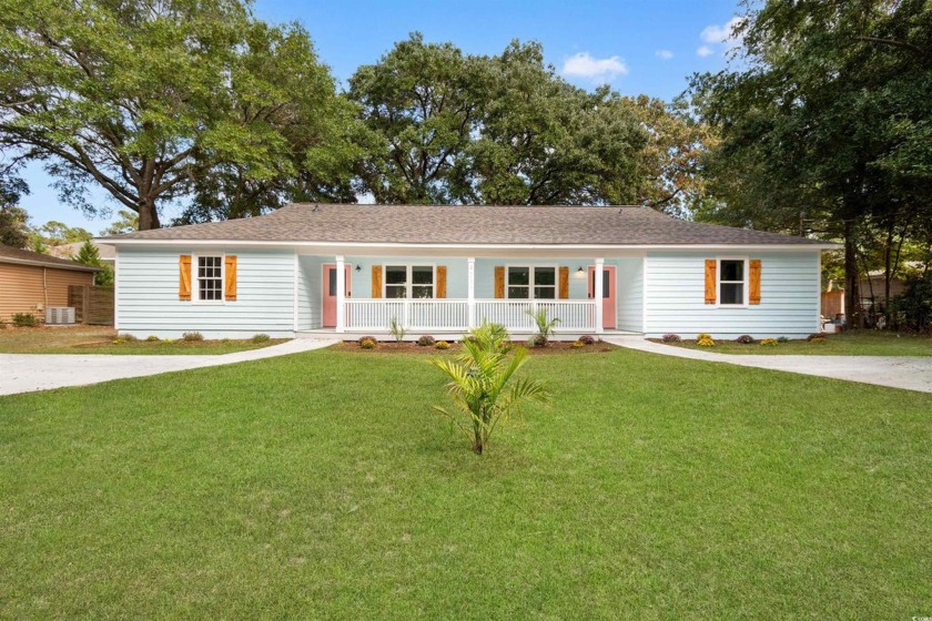 Welcome to your dream property! This stunning duplex, located - Beach Townhome/Townhouse for sale in Little River, South Carolina on Beachhouse.com