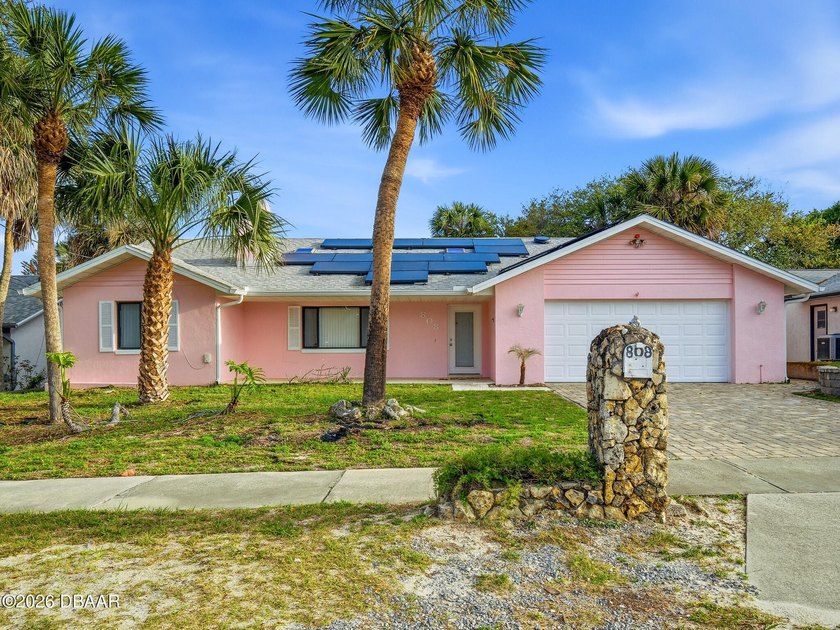 Discover the ultimate beachside lifestyle in this lovely - Beach Home for sale in New Smyrna Beach, Florida on Beachhouse.com