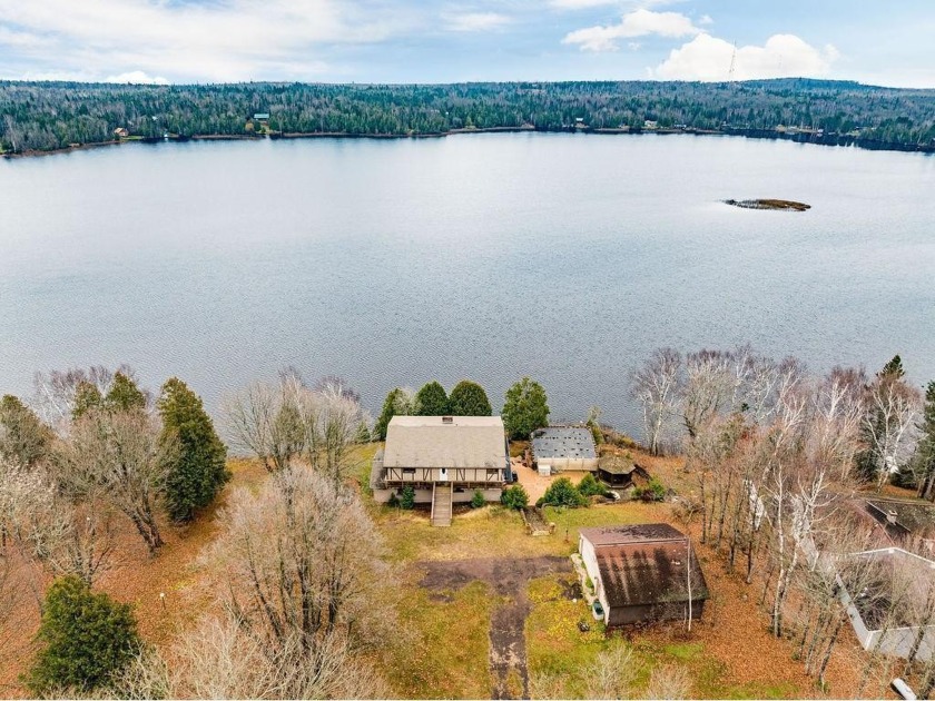 This beautiful property is bursting with potential! Nestled on - Beach Home for sale in Two Harbors, Minnesota on Beachhouse.com