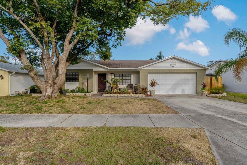 Fall in love with this beautifully renovated home perfectly - Beach Home for sale in New Port Richey, Florida on Beachhouse.com