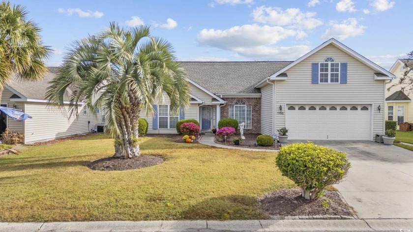 Welcome to this stunning 4BR-2BA home with a Carolina Room - Beach Home for sale in Surfside Beach, South Carolina on Beachhouse.com