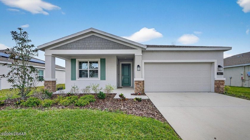 Welcome to this beautifully maintained lakefront home in - Beach Home for sale in Edgewater, Florida on Beachhouse.com