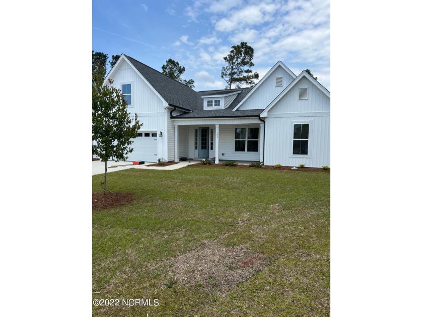 Be one of the first to own this extraordinary Otter floor plan - Beach Home for sale in Hampstead, North Carolina on Beachhouse.com