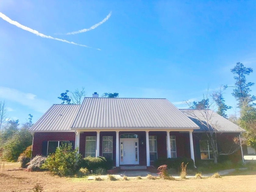 Check out the virtual tour! This beautiful custom built brick - Beach Home for sale in Wewahitchka, Florida on Beachhouse.com