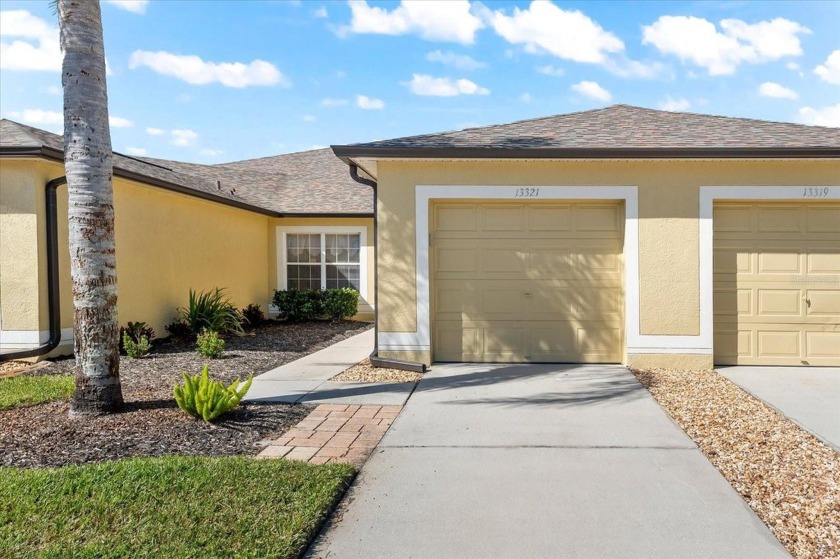 A MUST SEE!! MOVE IN READY VILLA! MAINTENCE FREE in a excellent - Beach Home for sale in Riverview, Florida on Beachhouse.com